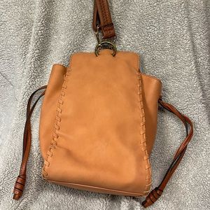 Universal thread cross body bag